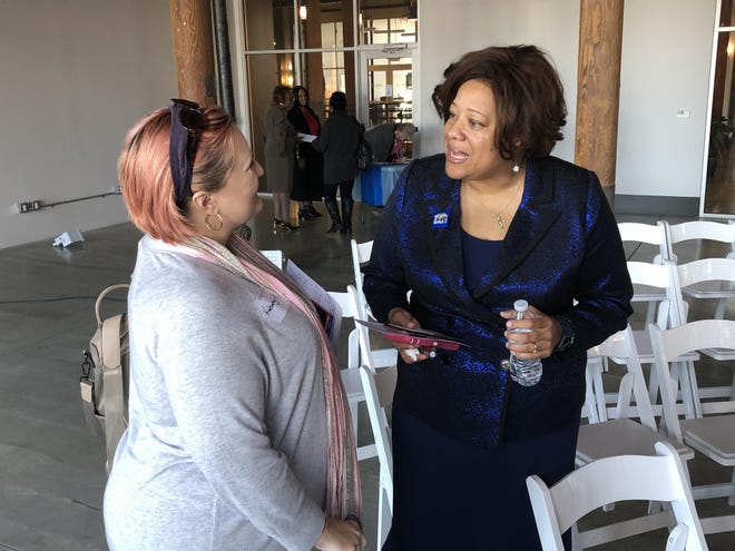 District 3 N.C. Sen. Erica Smith, right, who is running for a U.S. Senate seat in North Carolina, speaks with Kimberley Hallas during a gathering at the Loray Mill in Gastonia on Sunday, Feb. 9. [Michael Barrett/The Gaston Gazette]