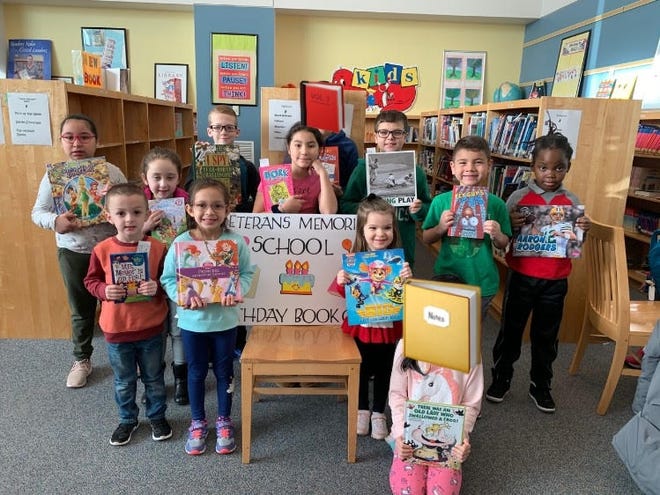 Members of the Veterans Memorial Elementary School January Birthday Book Club include top row, left to right, Fatima Montufer-Calix, Julianna Saschuk, Mason Lewis, Amani Guenanou, Brandan Lewis, Lucas Dos Santos and Johnathan H. Joseph; and second row, Trevor Mullen, Orly Diaz and Harper Cinelli (February birthday). Courtesy photo