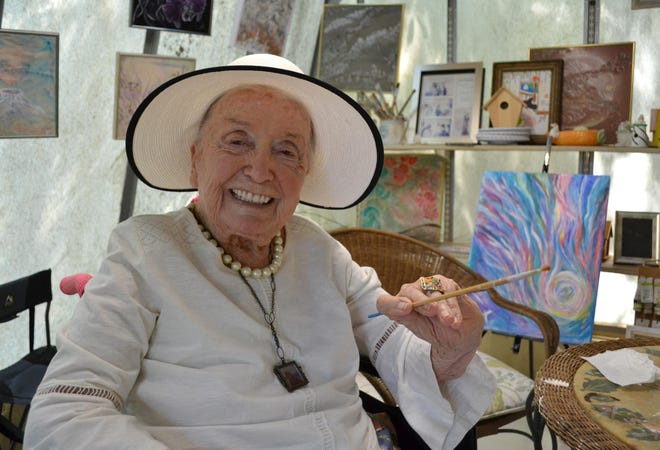 Hildegard Timberlake pauses between strokes of her paintbrush on Monday, Sept. 9, 2019, in Athens. At 97, she remains a dedicated and prolific member of the Athens Art Association. [Photo/Sarah Freund, Athens Banner-Herald]