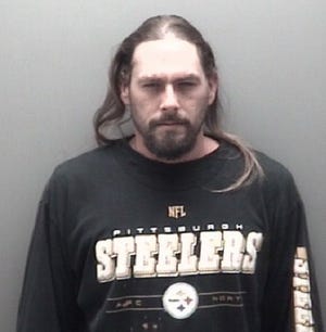 This photo provided by the Eaton County Sheriff's Department and released on April 17, 2109 shows Robert Carabello. Eaton County prosecutors say 35-year-old Caraballo was killed in Charlotte, where he lived, and his remains were found in a metal foot locker that had been set on fire and left in a wooded area of Ottawa County. Police in Rome say an American woman wanted in the 2002 death of her husband has been arrested in a Rome hotel. Rome police arrested Beverly McCallum after she checked in sat the hotel. Italian hotels are required to register guests in an online system linked to a police database. A police spokeswoman said that database flagged an international arrest warrant for McCallum's arrest. U.S. authorities had been seeking to extradite McCallum from Pakistan, where she was believed to be living, to stand trial in the slaying of her husband, Robert Caraballo. (Eaton County Sheriff's Department via AP)
