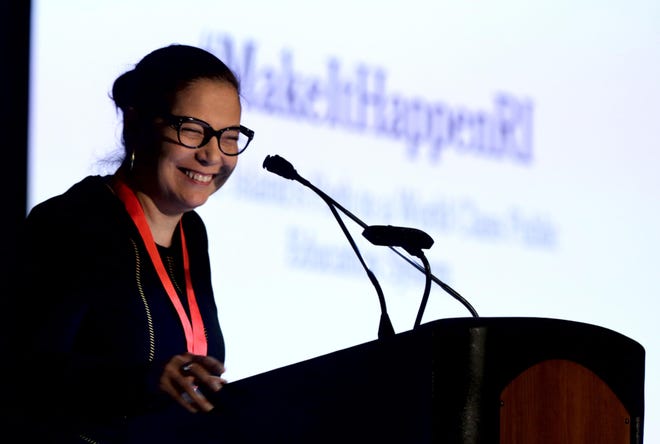 Education Commissioner Angélica Infante-Green in a lighter moment as she addresses the crowd at a daylong summit at the Rhode Island Convention Center on improving education statewide in December. [PROVIDENCE JOURNAL FILE PHOTO]