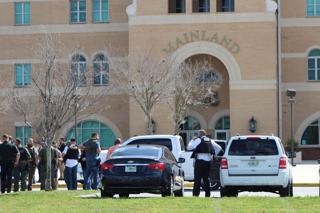 Four students are in police custody after a shooting scare at Mainland High School followed by a threat circulating on social media. [News-Journal/Frank Fernandez]