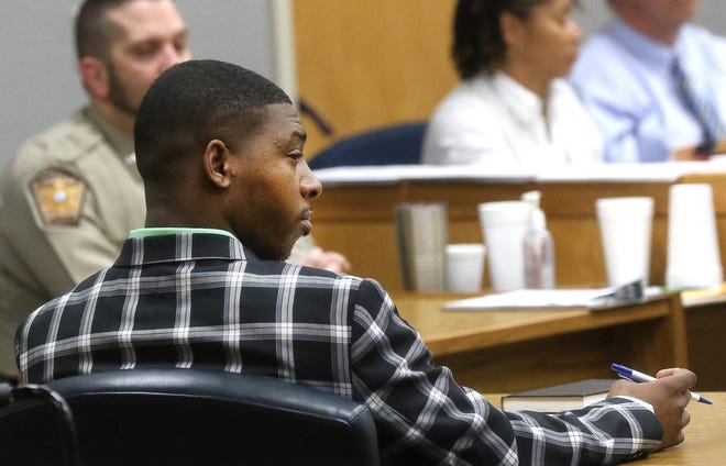 Marquis Graham sits in the court room during his trial Thursday morning at the Gaston County Courthouse. Graham is charged with first-degree murder for the 2017 death of 2-year-old Kye Rashid. [JOHN CLARK/THE GASTON GAZETTE]