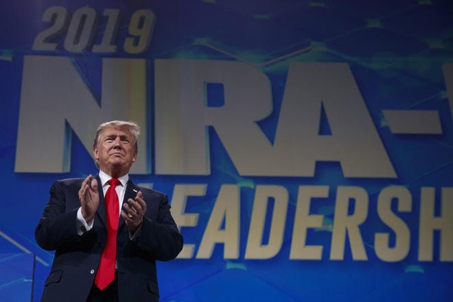 President Donald Trump arrives to speak to the annual meeting of the National Rifle Association, Friday, April 26, 2019, in Indianapolis. [AP FILE PHOTO]
