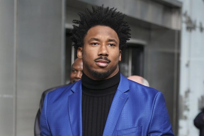 Browns defensive end Myles Garrett leaves an office building in New York after an appeals hearing to try to get the NFL to reduce a suspension that has ended Garrett’s season. [AP File Photo/Seth Wenig]