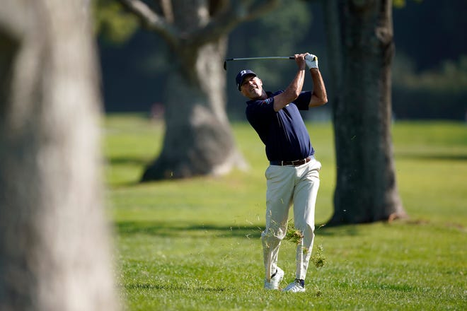 Matt Kuchar hits his second shot from the rough on the second hole during the third round of the Genesis Invitational golf tournament at Riviera Country Club, Saturday, Feb. 15, 2020, in the Pacific Palisades area of Los Angeles. (AP Photo/Ryan Kang)