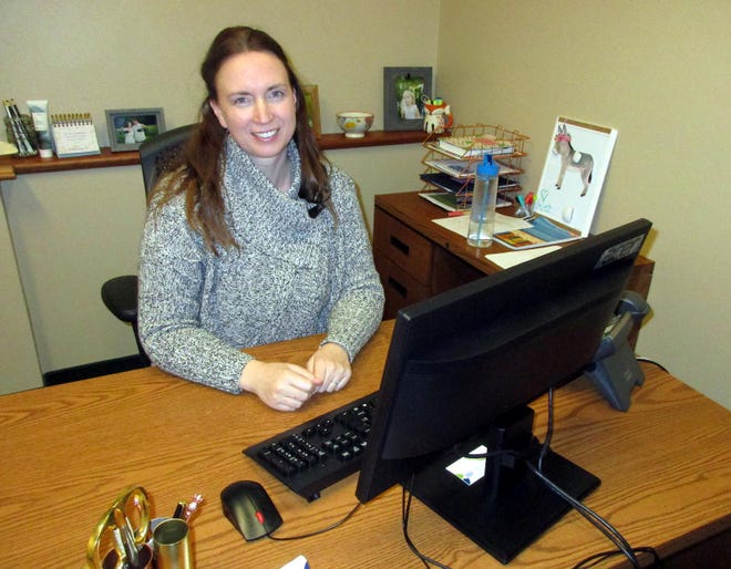 Commerce Chenango’s new director of membership and programs Mary Miner poses Feb. 13 in her Norwich office. Miner says she wants to hear from current and future members to see what might give their membership more value. [MIKE JAQUAYS/MID-YORK WEEKLY]