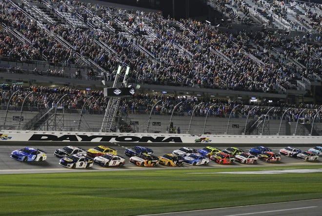 The customary pack of cars at Daytona, before the Big One starts culling the herd. [AP/Terry Renna]