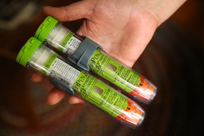 Two EpiPen Jr autoinjectors are seen in 2016. [TRIBUNE MEDIA SERVICE ARCHIVE]