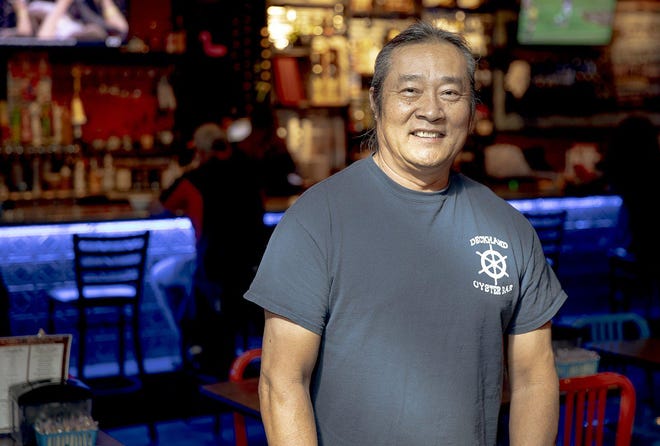 Tarzan Saybounkham, owner of Deckhand Oyster Bar, brings joy and energy to his restaurant's South Austin location. [NICK WAGNER / AMERICAN-STATESMAN]
