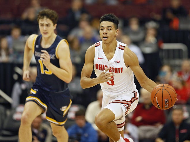 Ohio State guard D.J. Carton dribbles against Cedarville during an exhibition game on Oct. 30. [Kyle Robertson]