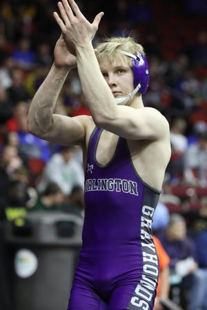 Burlington High School's Duncan Delzell looks towards the stands after defeating Council Bluffs Abraham Lincoln's Aiden Keller in their 132 pound first round match at the state wrestling tournament Thursday at the Wells Fargo Arena in Des Moines. [John Lovretta/thehawkeye.com]