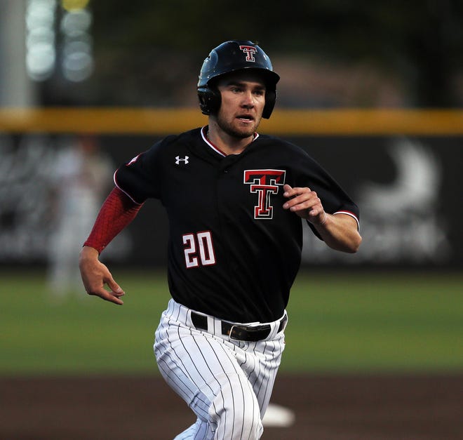 Texas Tech outfielder Max Marusak (20) steals third during a Big 12 game last year against Oklahoma State. The Amarillo High graduate is Tech coach Tim Tadlock’s first choice to bat leadoff this season, but aggravated a hamstring injury on opening day. [Sam Grenadier/A-J Media]