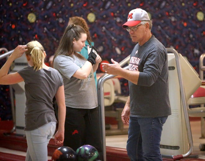 Minerva bowling coach Dana Keister and the Lions will be seeking their second straight state berth in the Division II district tournament in Zanesville on Friday. (CantonRep.com / Scott Heckel)
