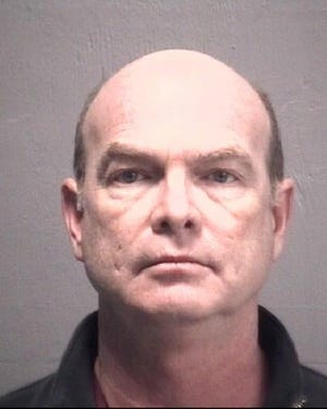 Michael Hasson, who operates Wilmington Oral Surgery, is out on bail but under house arrest. The court ordered that he cannot see patients and his state dental license was suspended last February. [COURTESY NHSO]