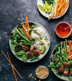 These Vietnamese meatballs, inspired by the Elizabeth Street Cafe in Austin, are from “The Defined Dish" by Alex Snodgrass. [Contributed by Kristen Kilpatrick]