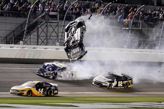 As bad as Ryan Newman’s wreck was, it might’ve been much worse if he’d hit above the wall and into the catch-fence. [AP/Terry Renna]