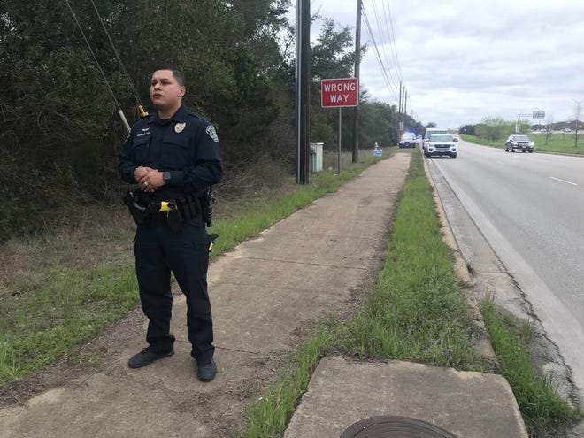 Austin Police Officer Bino Cardenas updates the public on an investigation involving the suspicious death of a homeless man in South Austin. [LUZ MORENO-LOZANO/AUSTIN STATESMAN]