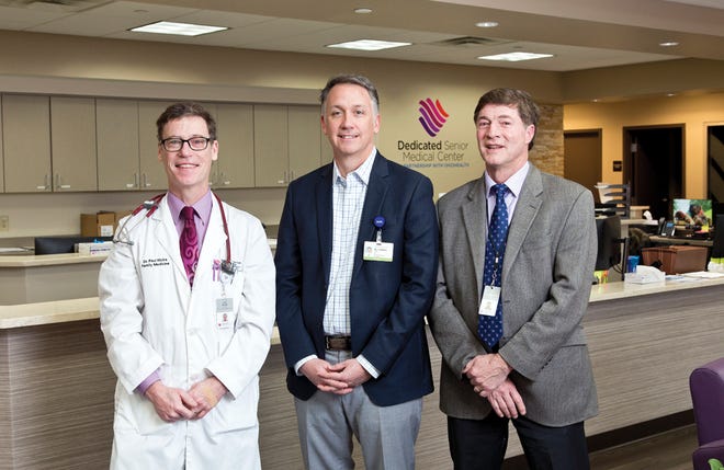 Dr. Paul Hicks and Tom Shanahan of ChenMed with Dr. Jim O'Brien of OhioHealth, center.