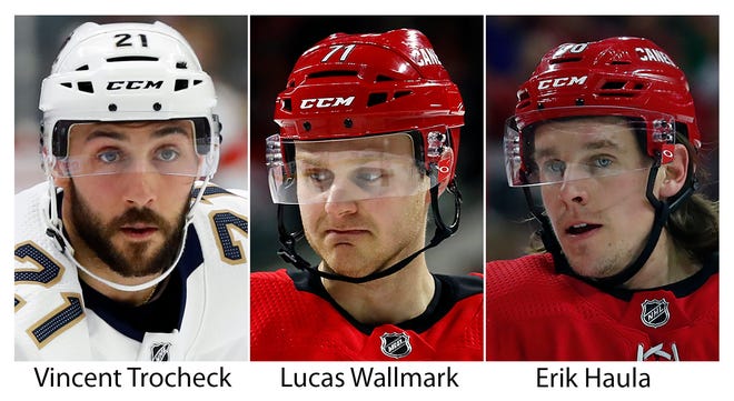 FILE - From left are file photos showing Vincent Trocheck, Lucas Wallmark and Erik Haula. The Carolina Panthers traded Vincent Trocheck to the Carolina Hurricanes for Erik Haula, Lucas Wallmark and prospects Chase Priskie and Eetu Luostarinen, Monday, Feb. 24, 2020. (AP Photo/File
