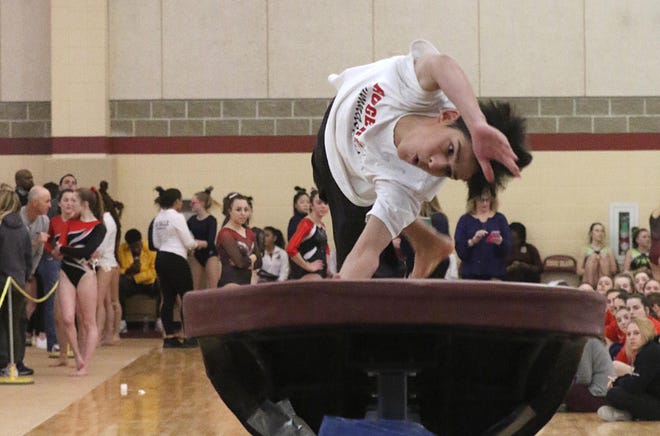 Rogers sophomore Joshua Ally-Bergen prepares to hit the vault during Saturday’s state gymnastics meet at Rhode Island College. [SANDOR BODO/THE PROVIDENCE JOURNAL]