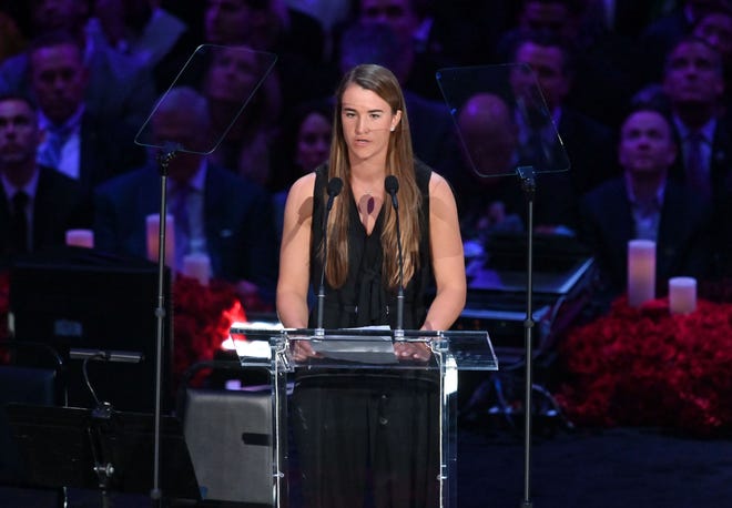 Oregon basketball player Sabrina Ionescu speaks during the memorial to celebrate the life of Kobe Bryant and daughter Gianna Bryant at Staples Center. [Robert Hanashiro-USA TODAY Sports]