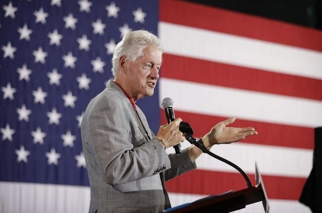 Bill Clinton campaigns for his wife, Hillary Clinton, in 2016. [AP file photo | John Locher]