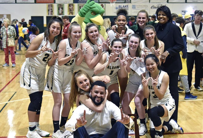 The Saint Stephen’s girls basketball program celebrates after winning the first region title in program history. Saint Stephen's will play Tampa Carrollwood Day Wednesday at 8 p.m. in a State Final 4 Class 3A semifinal game in Lakeland. [HERALD-TRIBUNE STAFF PHOTO / THOMAS BENDER]