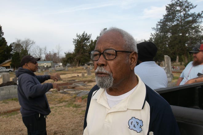 Historian Ben Watford, pictured here during an archological dig at Greenwood Cemetery, has led a fight to right the wrongs of blacks disinterred from Cedar Grove Cemetery in 1914 to make room for more plots for whites. His efforts come to fruition in a program on Saturday. [Bill Hand / Sun Journal Staff]