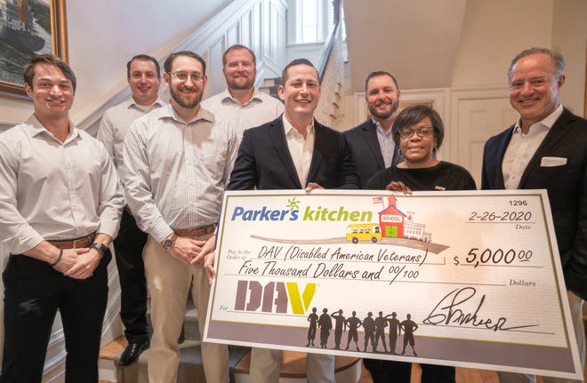 arker’s founder and CEO Greg Parker, right, and Parker’s President Jeff Bush, center, recently presented a $5,000 donation to DAV Southeast Regional Director of Personal Philanthropy Programs Trisa Paschal, second from right, to support programs that assist military veterans and their families. Parker’s Application and Security Manager Andrew Cooper, Director of Finance Keith Saltzman, Fuel Procurement Manager Josh Cohen and Vice President of Marketing Brandon Hofmann (l-r), all of whom are military veterans, attended the check presentation at the Parker’s headquarters in Savannah. [Photo provided]