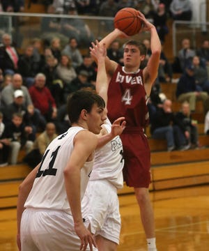 Dover’s Kade Ruegsegger shoots for a 3-pointer in the Division I sectional semifinal at Perry Wednesday night. (TimesReporter.com / Jim Cummings)