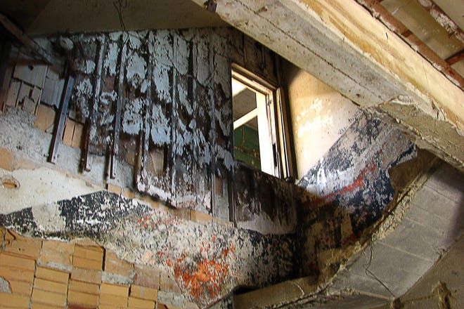 Very often, mold is a sign of something seriously wrong in the home - water damage, which can wreak as much destruction as fire, swiftly and silently. [lisaleo/Morguefile]