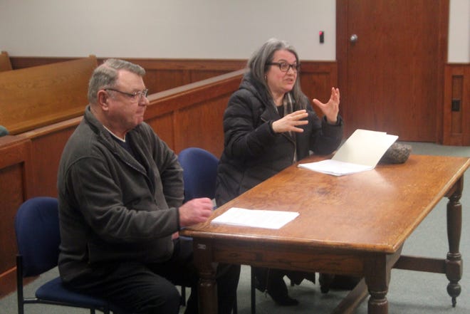 Dennis Sitzer, chair of the Committee to Support the Senior Millage for Ionia County, (left) and Carol Hanulcik, director of the Ionia County Commission on Aging, speak to the Ionia County Board of Commissioners at its meeting on Tuesday, Feb. 25. [Evan Sasiela/Sentinel Staff]