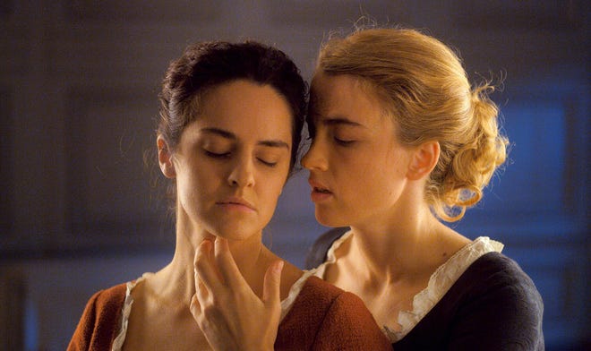 Adèle Haenel, left, and Noémie Merlant in "Portrait of a Woman on Fire." [Neon]