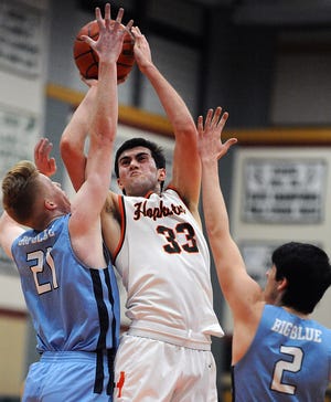 Hopkinton senior Elan Rosen goes up strong against Medfield earlier this month. On Thursday, he helped the Hillers knock out the No. 1 seed in the Division 2 Central sectional. [Daily News and Wicked Local Staff File Photo/Art Illman]