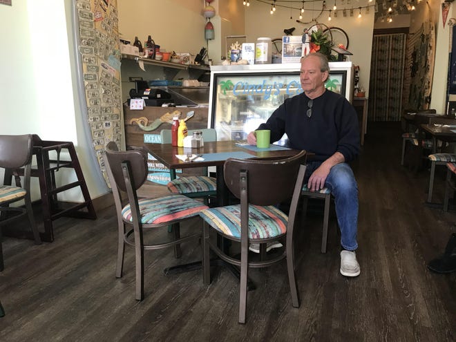 Steve Demshick, owner, sits in the dining room of Cindy’s Cafe at 307 Mill Street in Bristol. He opened the place a year ago and named it in tribute to his wife of 42 years. [JD MULLANE / STAFF PHOTOJOURNALIST]