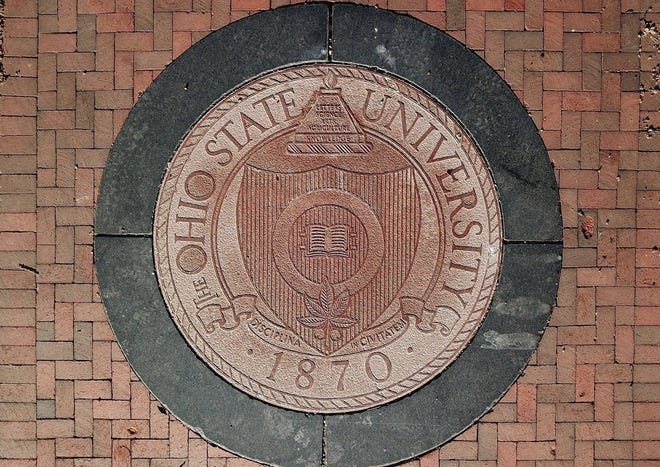 The Ohio State University seal at the East entrance to the Oval. [Dispatch file photo]