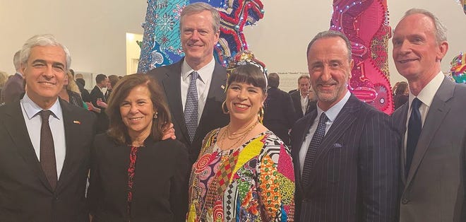 Massachusetts Governor Charlie Baker (third from the left) with Portuguese Ambassador Domingos Fezas Vital and his wife Isabel, Portuguese artist Joana Vasconcelos, Consul General of Portugal in Boston João Pedro Fins do Lago and MassArt President David P. Nelson at the unveiling of “Valkyrie Mumbet” Feb. 22 at the MassArt Art Museum.