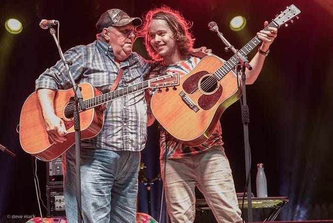 Apostol (right), grew up in Muir. His stepfather, Terry Barber (left), was a picker in the Michigan bluegrass scene. The pair are performing in Ionia Saturday. [Contributed]