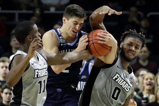 Villanova’s Collin Gillespie, in action against PC on Jan. 25, is questionable for Saturday’s rematch in Philadelphia.