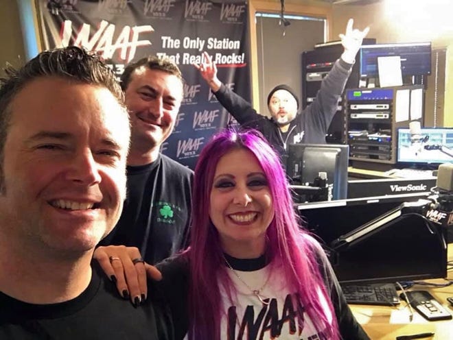 Sean Corcoran takes a selfie with Ed Johnson, Mistress Carrie and Mike Hsu in the Boston studio during the final broadcast on WAAF Feb. 21. [PhotoSean Corcoran.