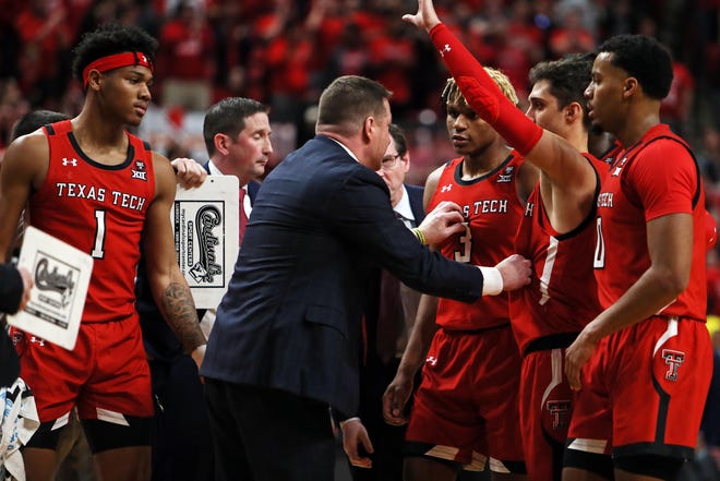 Texas Tech head coach Chris Beard pulls his team in for a huddle during a Big 12 Conference game Saturday against Texas at United Supermarkets Arena. The Red Raiders lost to the Longhorns 68-58. [Sam Grenadier/A-J Media]
