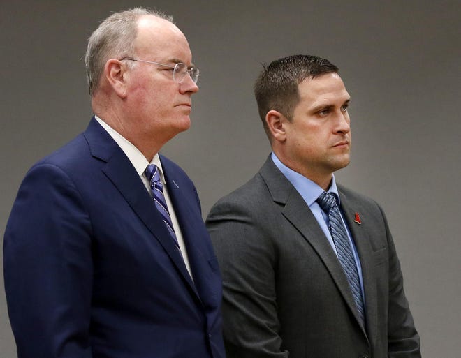 Joshua Hunsucker, right, stands with his attorney David Teddy during his hearing Monday morning at the Gaston County Courthouse. Hunsucker is charged with first-degree murder in the September 2018 death of his wife Stacy Robinson Hunsucker. [JOHN CLARK/THE GASTON GAZETTE]