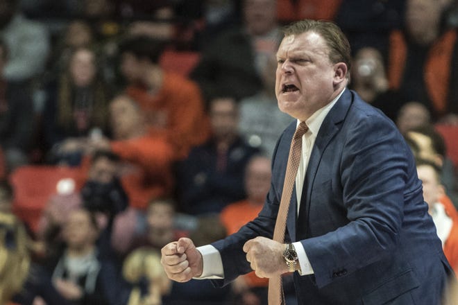 Illinois head coach Brad Underwood works to rally his team from the sideline vs Northwestern in the second half of an NCAA college basketball game, Saturday Jan. 18, 2020, in Champaign, Ill. (AP Photo/Holly Hart)