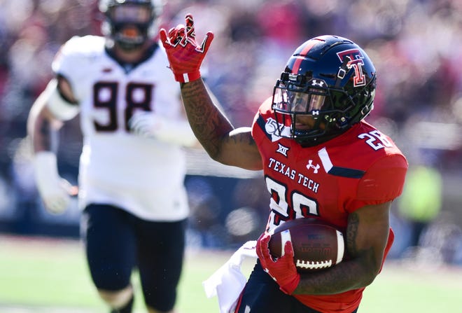 Texas Tech running back Ta'Zhawn Henry (26), a 300-yard rusher in each of his first two seasons, announced Monday he is seeking to transfer. [Justin Rex/A-J Media]