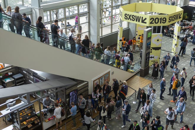 Festival-goers move through SXSW at the Austin Convention Center, Sunday, March 10, 2019. [Stephen Spillman for Statesman]
