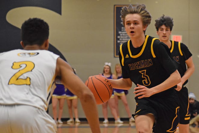 Hickman’s Ben Wilson (3) dribbles the ball during a Class 5 District 9 quarterfinal game against Smith-Cotton on Monday night at Battle High School. [Langston Newsome/Tribune]