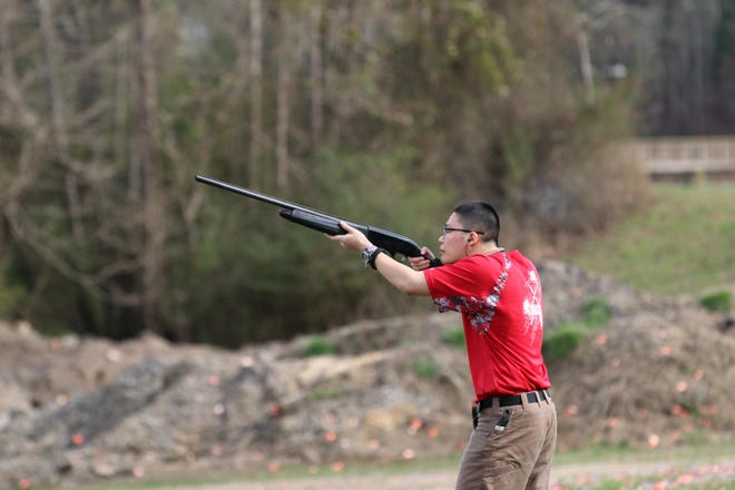Axe Shen prepares to shoot a clay target. [Randy Erwin/Special to the Gazette]