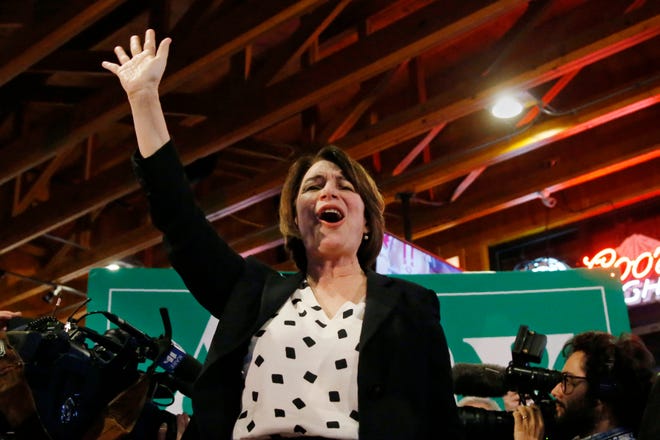Democratic presidential candidate Sen. Amy Klobuchar, D-Minn., waves as she speaks at a campaign event Sunday, Feb. 2, 2020, in Johnston, Iowa. [SUE OGROCKI/THE ASSOCIATED PRESS]