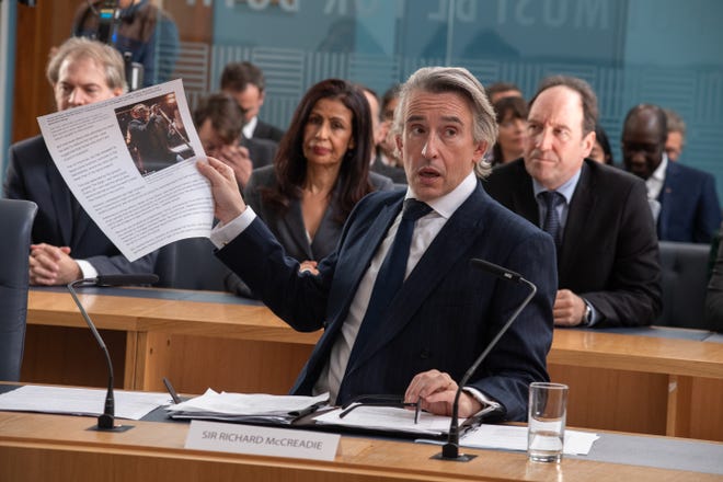 Richard McCreadie (Steve Coogan) attempts to explain away a courtroom accusation. [Sony Pictures Classics]